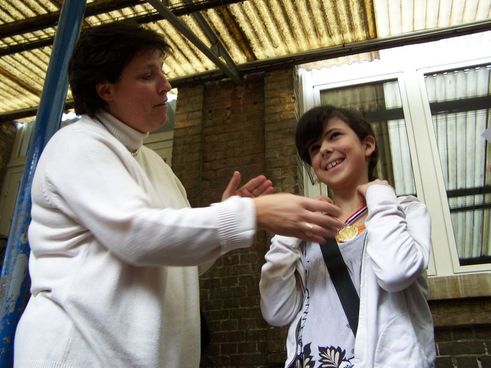 La Directrice des Etudes et la médaille d'or filles